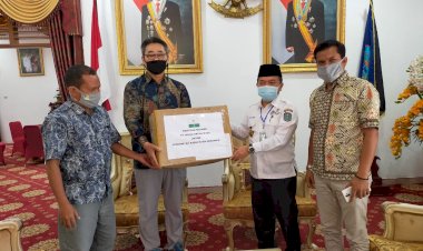 PT HAN Serahkan Ribuan Masker ke Bupati Merangin