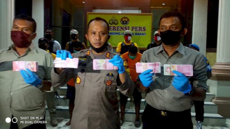Di Tanjab Barat, Polisi Amankan Uang Palsu Ratusan Juta, 4 Pelaku Berhasil Ditangkap