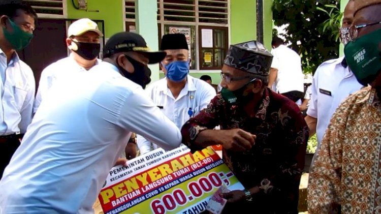 Keliling Dusun, Bupati Bungo Pastikan Bantuan Covid-19 Tersalurkan