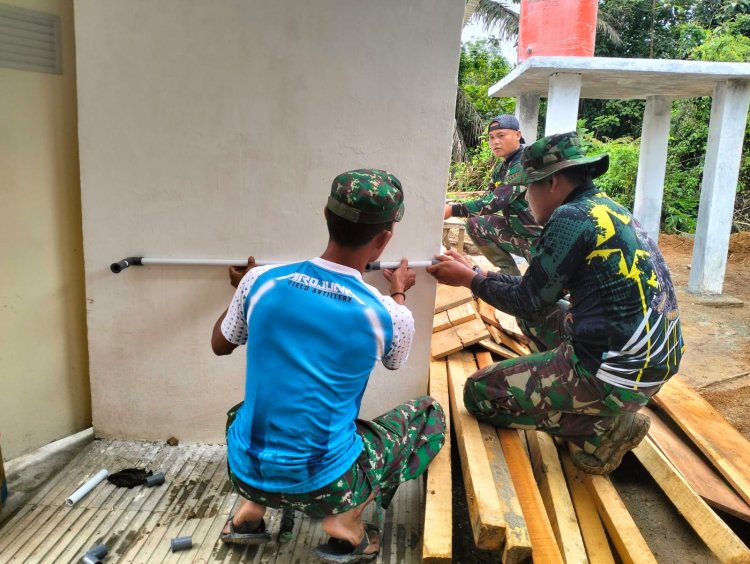 Satgas TMMD ke-123 Kodim 0416/Bute: Pemasangan Instalasi Pipa Air untuk MCK di Madrasah Ibtidaiyah Nurul Falah